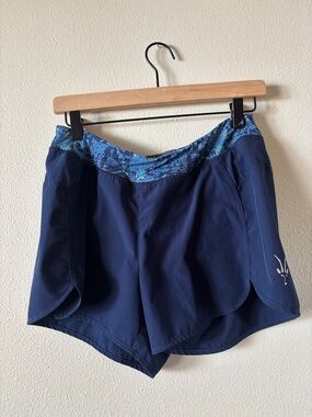 Ibex Women’s navy blue running shorts size medium merino wool lined